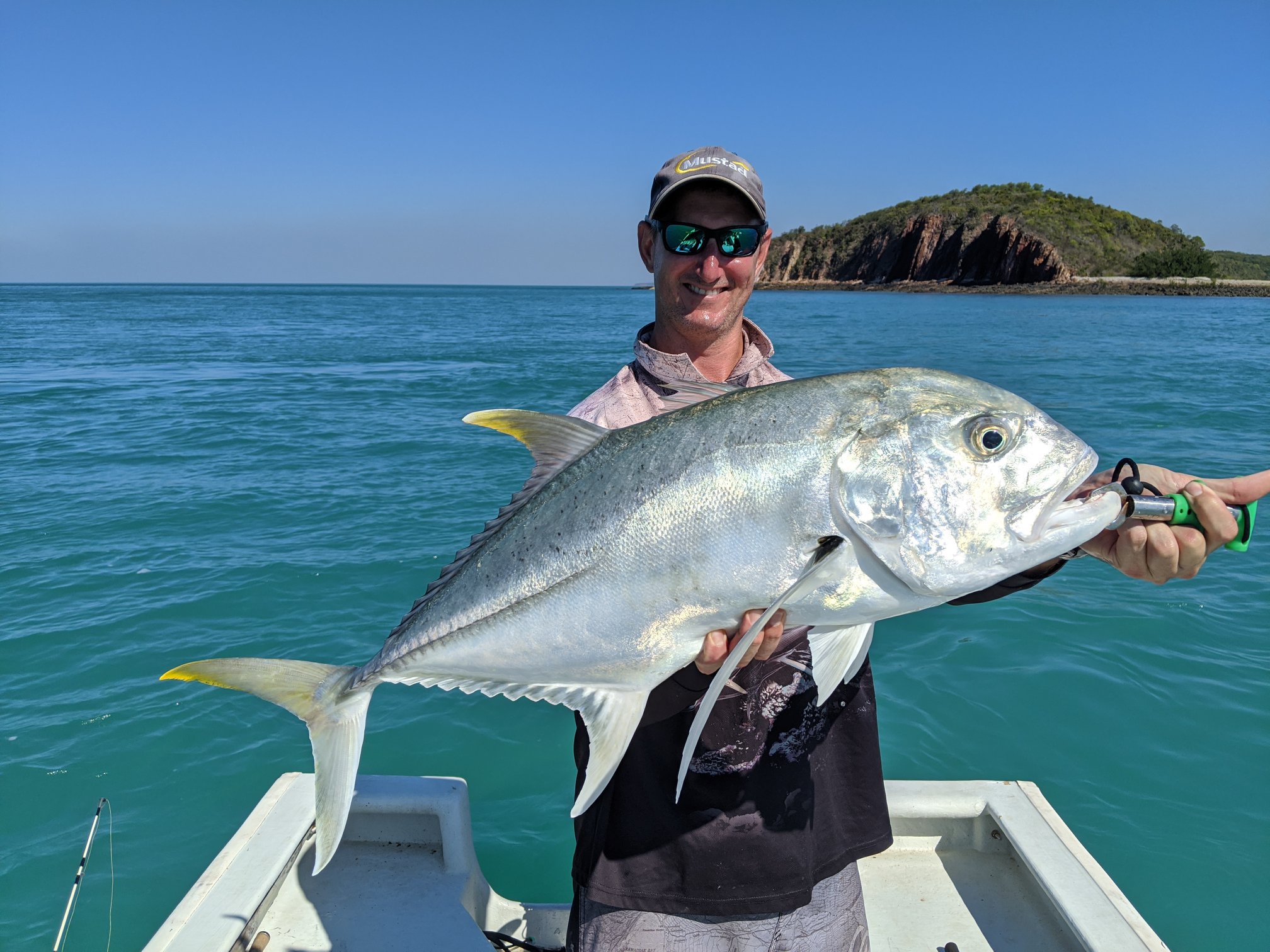 Fisherman with great Golden Trevelly after a tremendous fight off Arnhem land