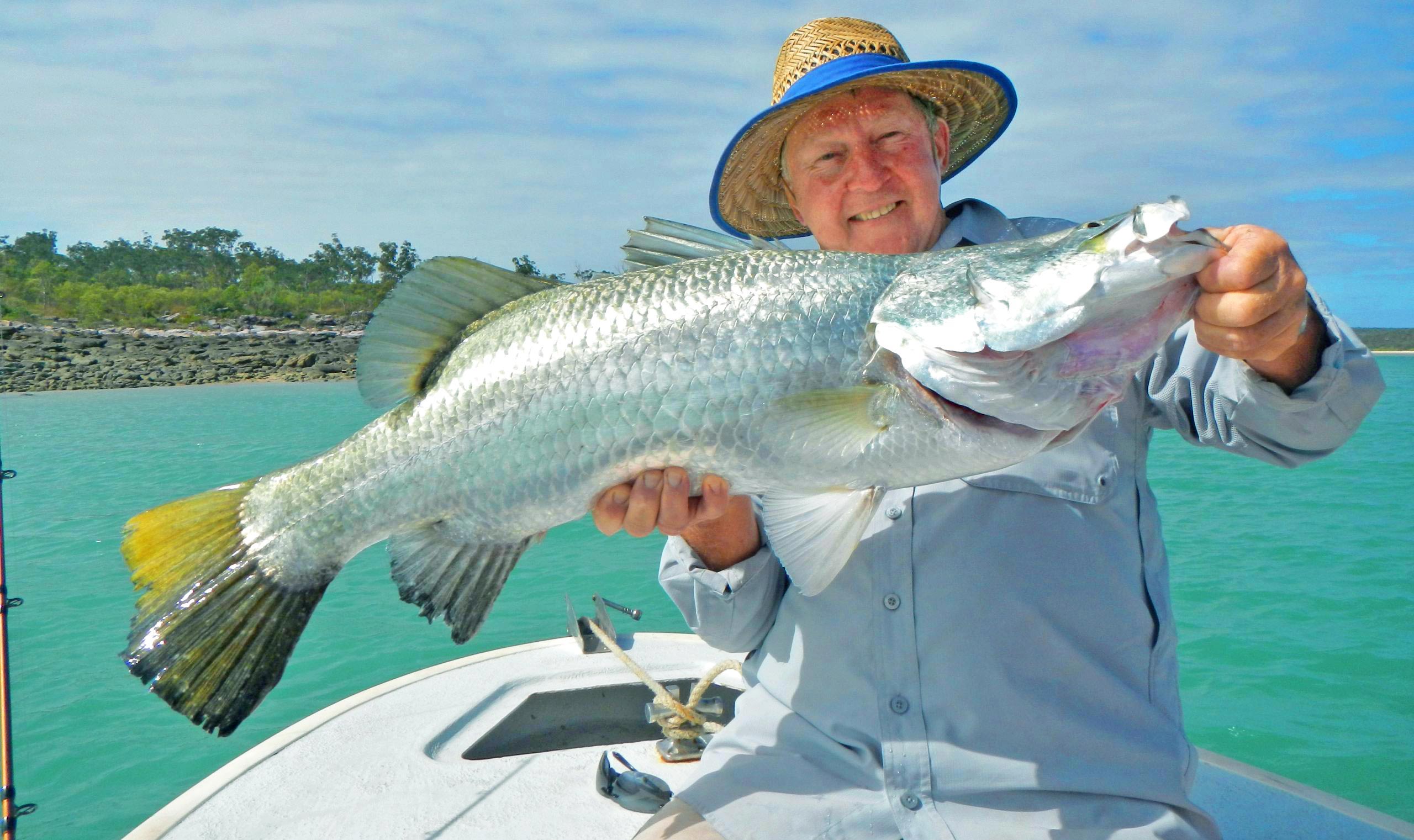 A sports fishing adventure catching silver headland Barramundi. Bill catching a beautiful big Top-End barramundi. The NE Arnhem Land is a Top-End paradise for sports fishing.