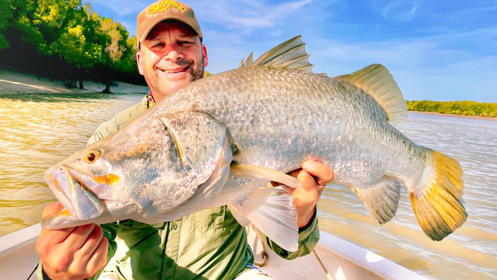 A beautiful barramundi catch by a fisherman on Australian Sportfishing Charters