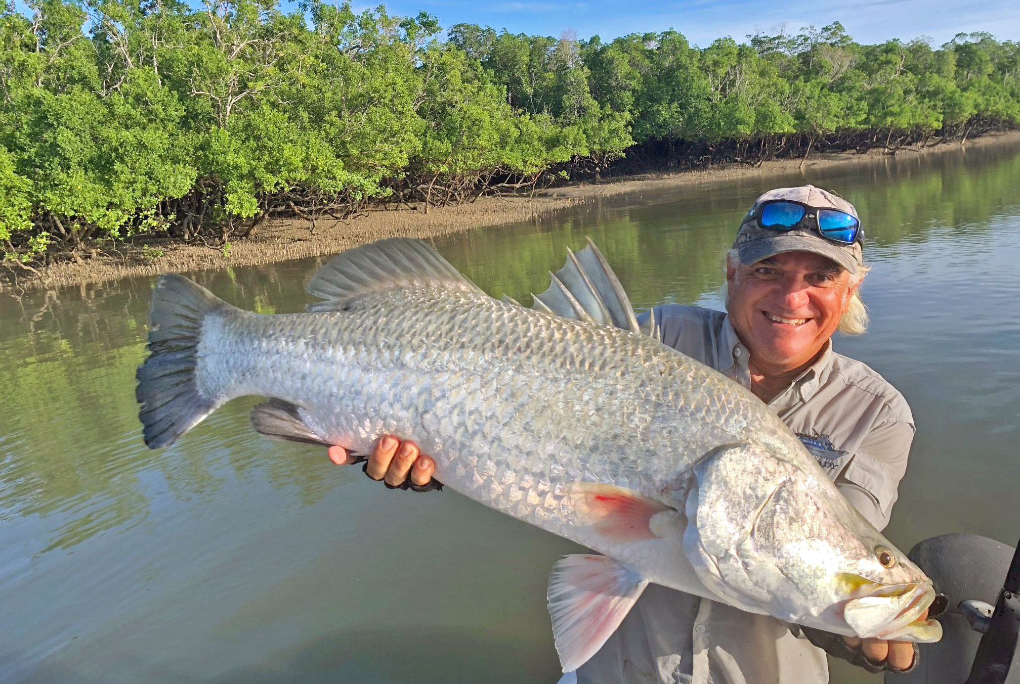 Captain Dan from Australian Sportfishing Charters with a huge Barramundi catch