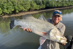 Captain Dan from Australian Sport Fishing Charters with an amazing barramundi catch