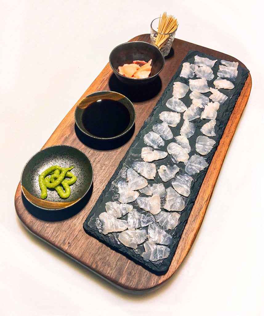Delicious Sashimi dish of King Threadfin Salmon aboard Australian Sportfishing Charters